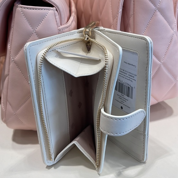 Kate Spade Carey Medium Compartment Bifold Wallet 
COLOR: Parchment - Picture 10 of 16
